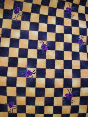 1940 apron comes in this fun black/orange gingham with purple spiders.